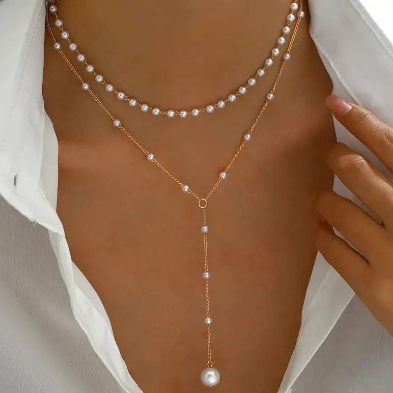 Nair | de perlas de dos hileras con colgante