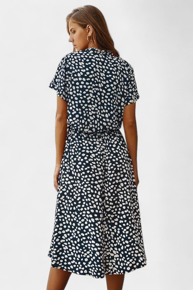 Rovena | Vestido Midi de Lunares con Cuello Camisero y Cintura Ajustable