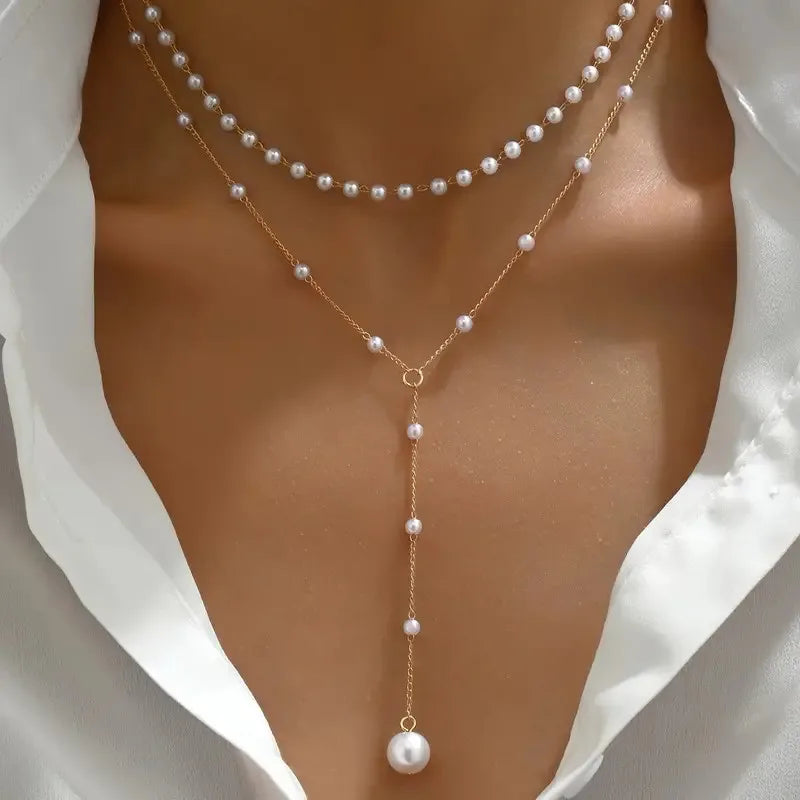 Nair | de perlas de dos hileras con colgante