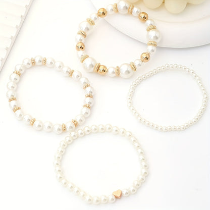 Lorena-Bárbara | de elegantes pulseras en forma de corazón con perlas