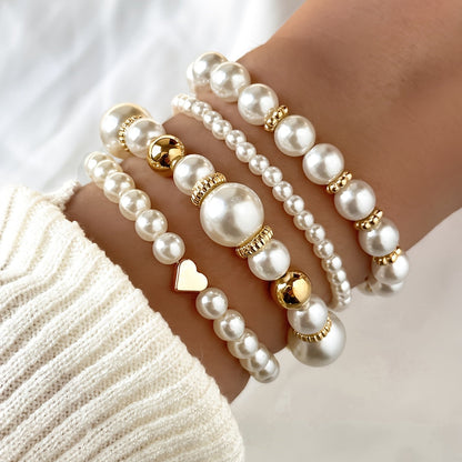 Lorena-Bárbara | de elegantes pulseras en forma de corazón con perlas