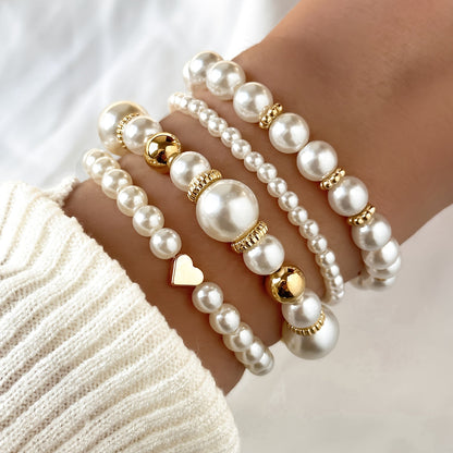 Lorena-Bárbara | de elegantes pulseras en forma de corazón con perlas