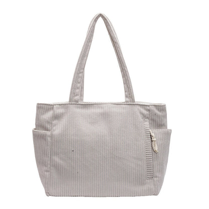 Tilda | Bolsa de hombro acanalada con detalle de cordón