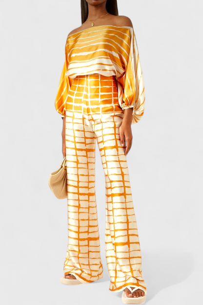 Helena-Joana | Conjunto de Dos Piezas con Hombros Descubiertos y Pantalones Amplios Estampados